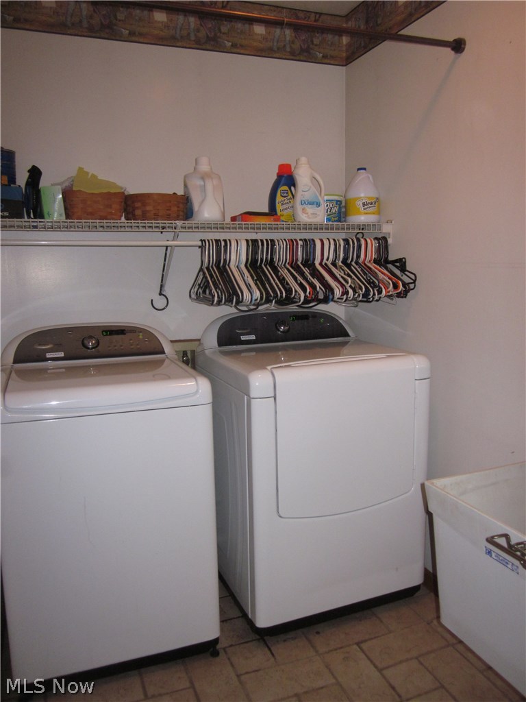 9605 Lowmiller Road Minerva, OH 44657 - Photo 14 of 18 Laundry room on ground level with wash tub