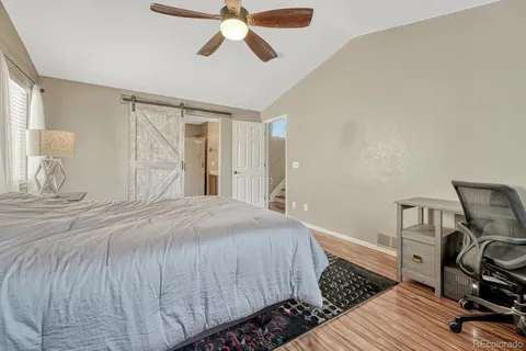 a en suite bathroom with double vanity and a mirror