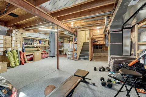 a view of a backyard with sitting area