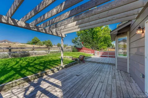 a view of a garden with an outdoor space