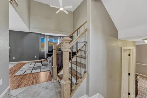 a kitchen with granite countertop cabinets stainless steel appliances and a counter space