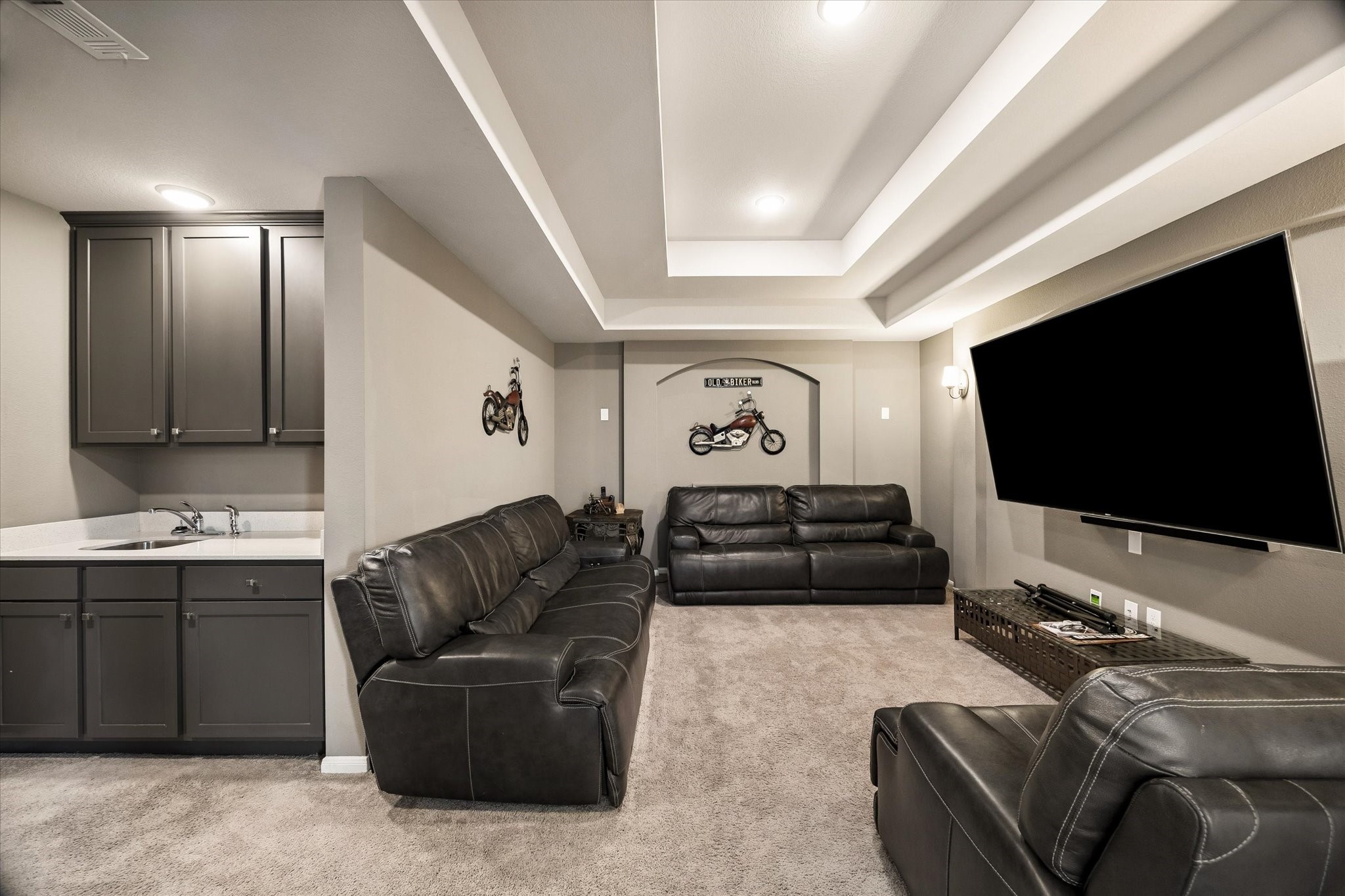 1907 Sapphire Pines Lane Rosenberg, TX 77469 - Photo 25 of 43 MEDIA ROOM IS LOCATED UPSTAIRS OFF OF THE GAMEROOM AND FEATURES A WET BAR