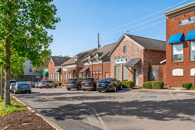 a huge green field with lots of trees