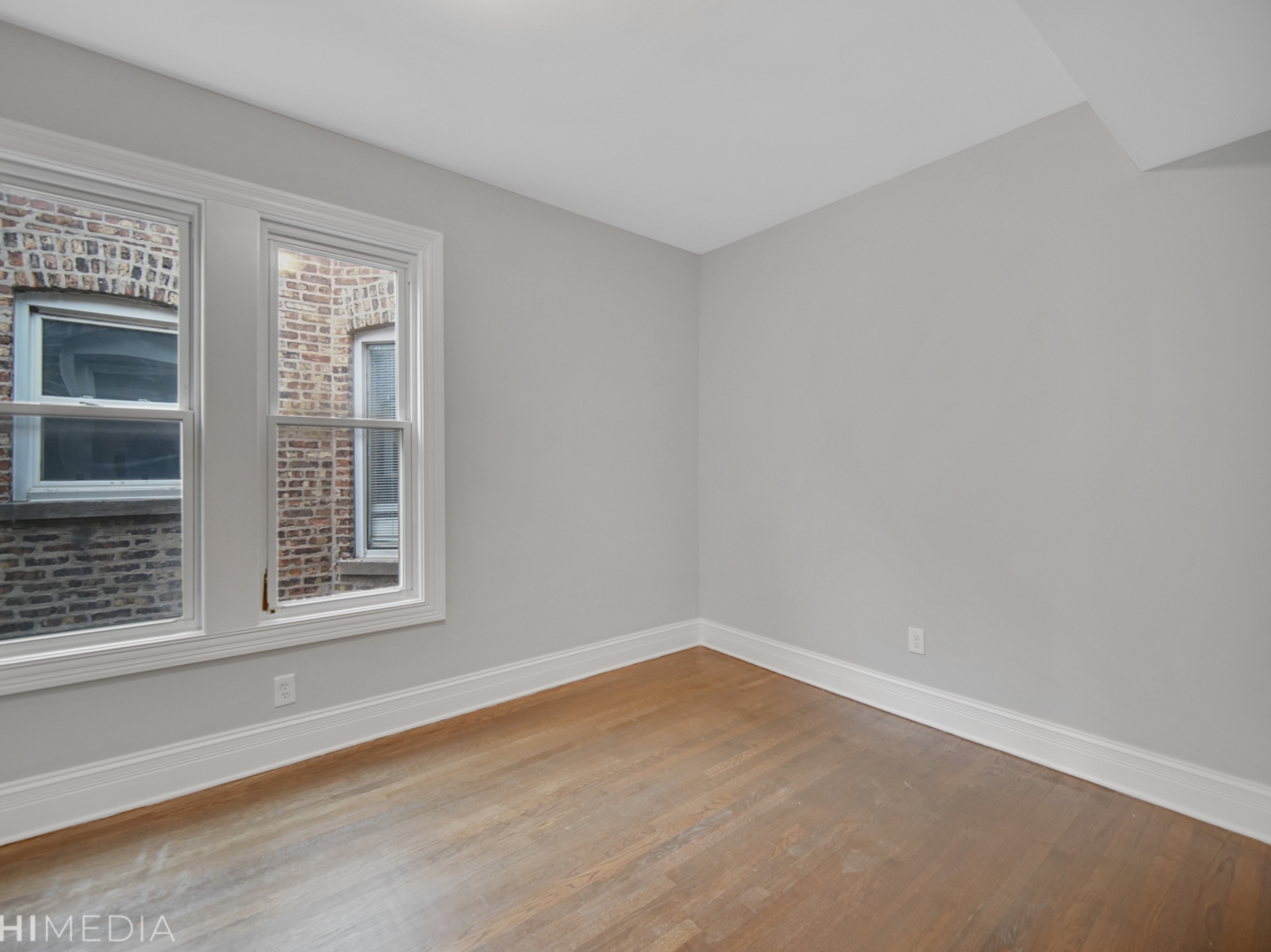 6234 South Rhodes Avenue Chicago, IL 60637 - Photo 8 of 36 a view of a room that has a window in it