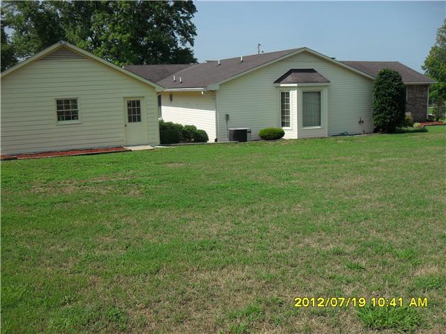 670 Baker Road Columbia, TN 38401 - Photo 5 of 19 BACK VIEW OF MASTER BED ROOM AND DETACHED GARAGE