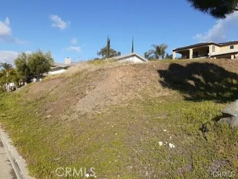 a view of a backyard of the house