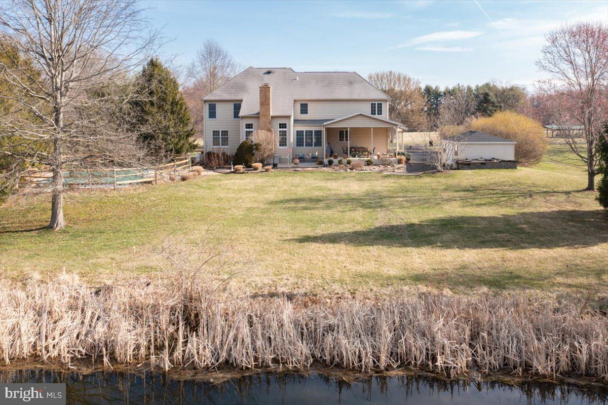 4358 Bergstrom Road Doylestown, PA 18902 - Photo 38 of 39 Early Spring View from the Pond