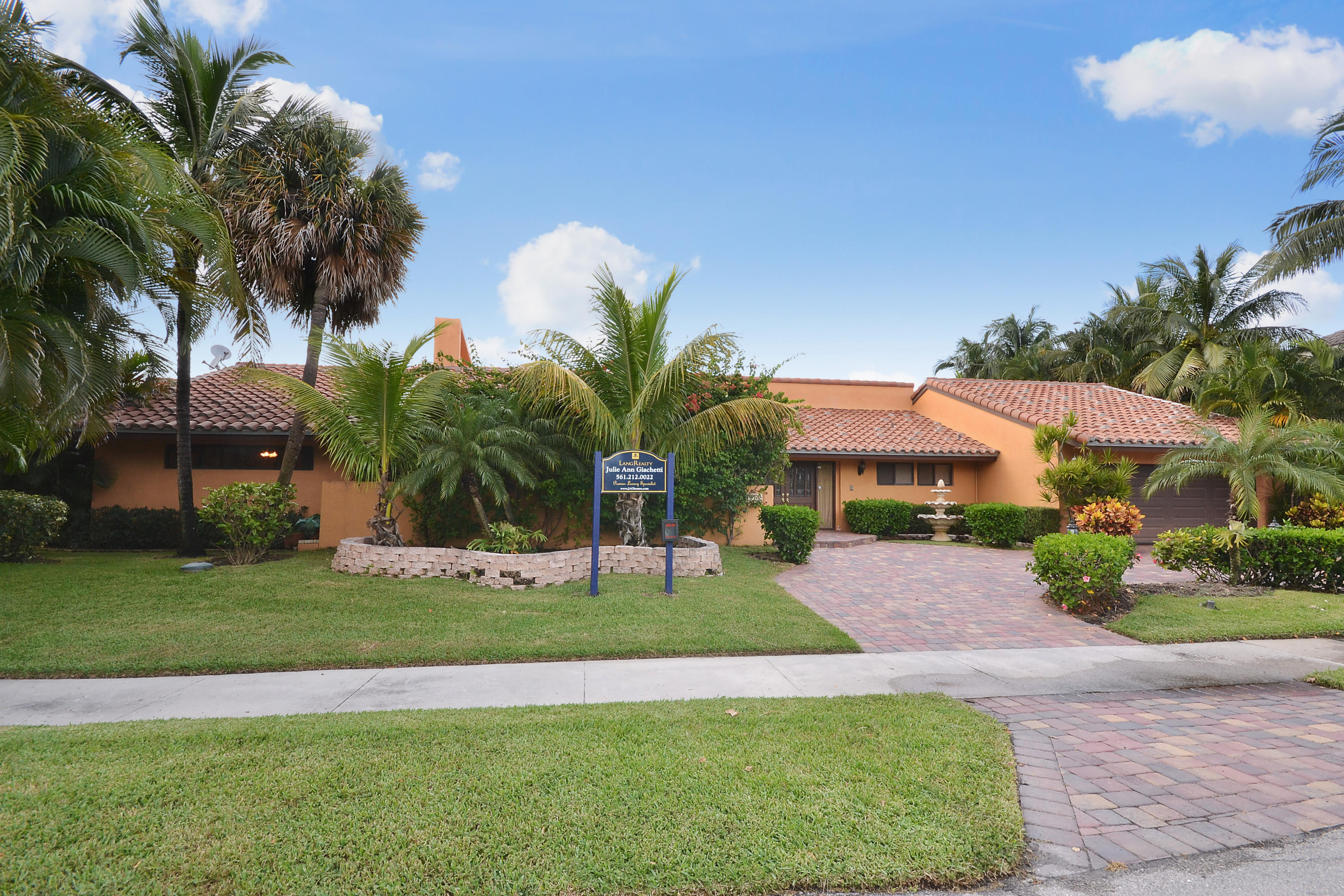 7401 Northeast 8th Court Boca Raton, FL 33487 - Photo 2 of 15 Front of Property