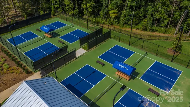 a aerial view of a yard tables and chairs in the patio