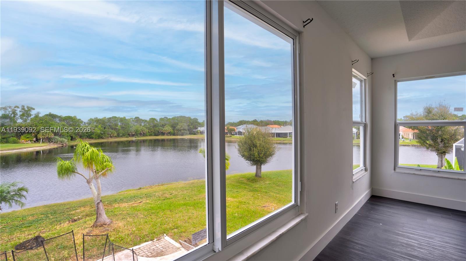 7109 Waldon Pond Stuart, FL 34997 - Photo 13 of 20 a view of a lake from a balcony
