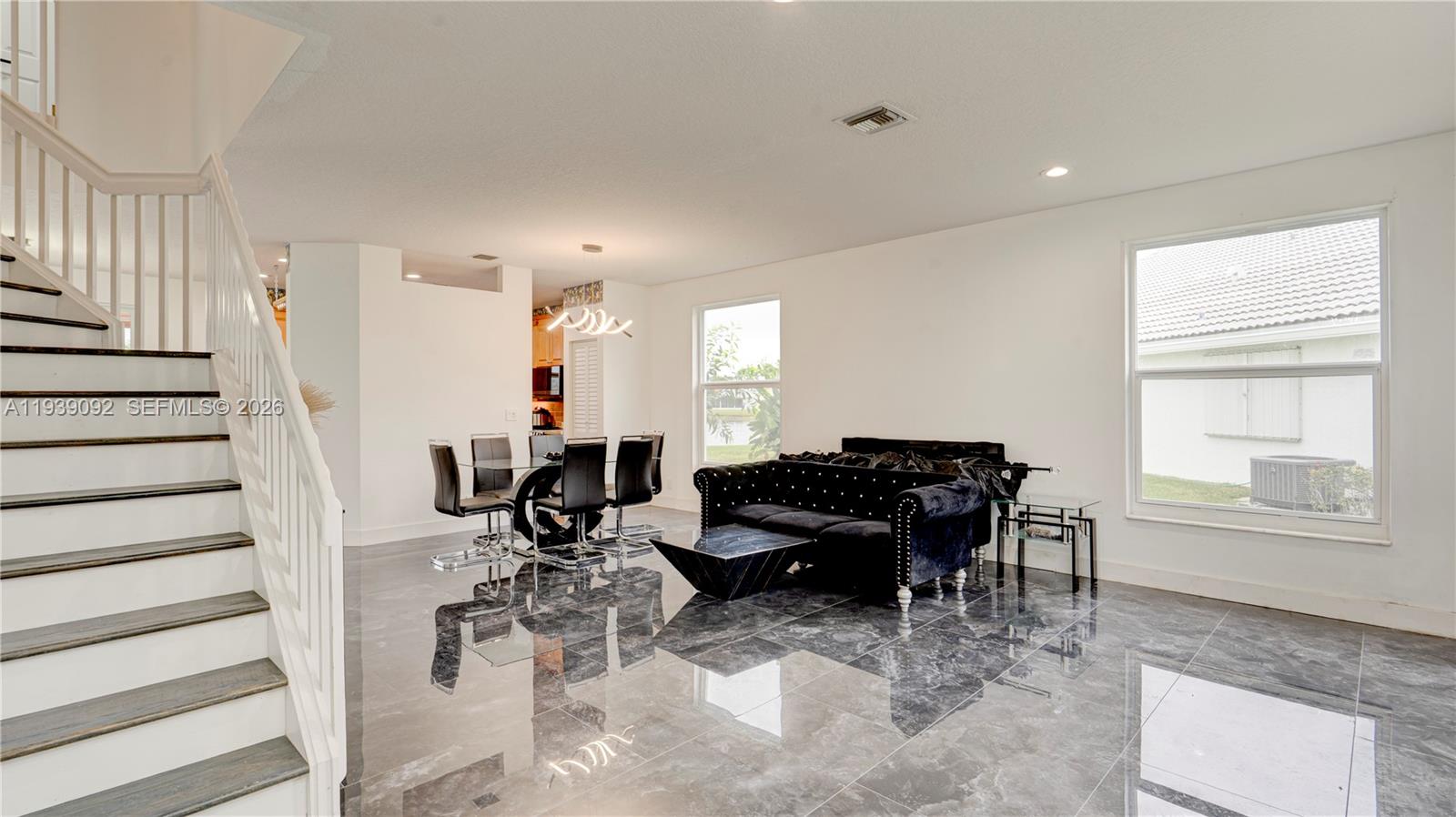 7109 Waldon Pond Stuart, FL 34997 - Photo 8 of 20 a living room with furniture