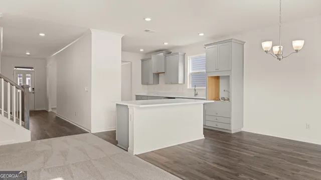 a view of livingroom with hardwood and hallway