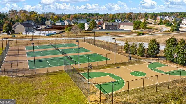 a view of a swimming pool with an outdoor seating