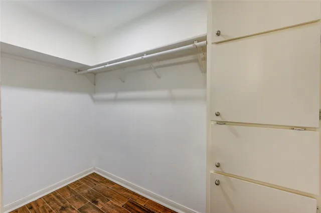 a bathroom with a sink double vanity granite and a mirror