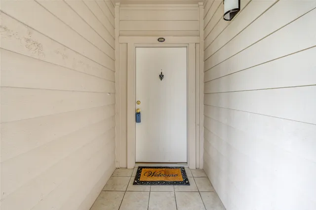 a view of a building with a yard