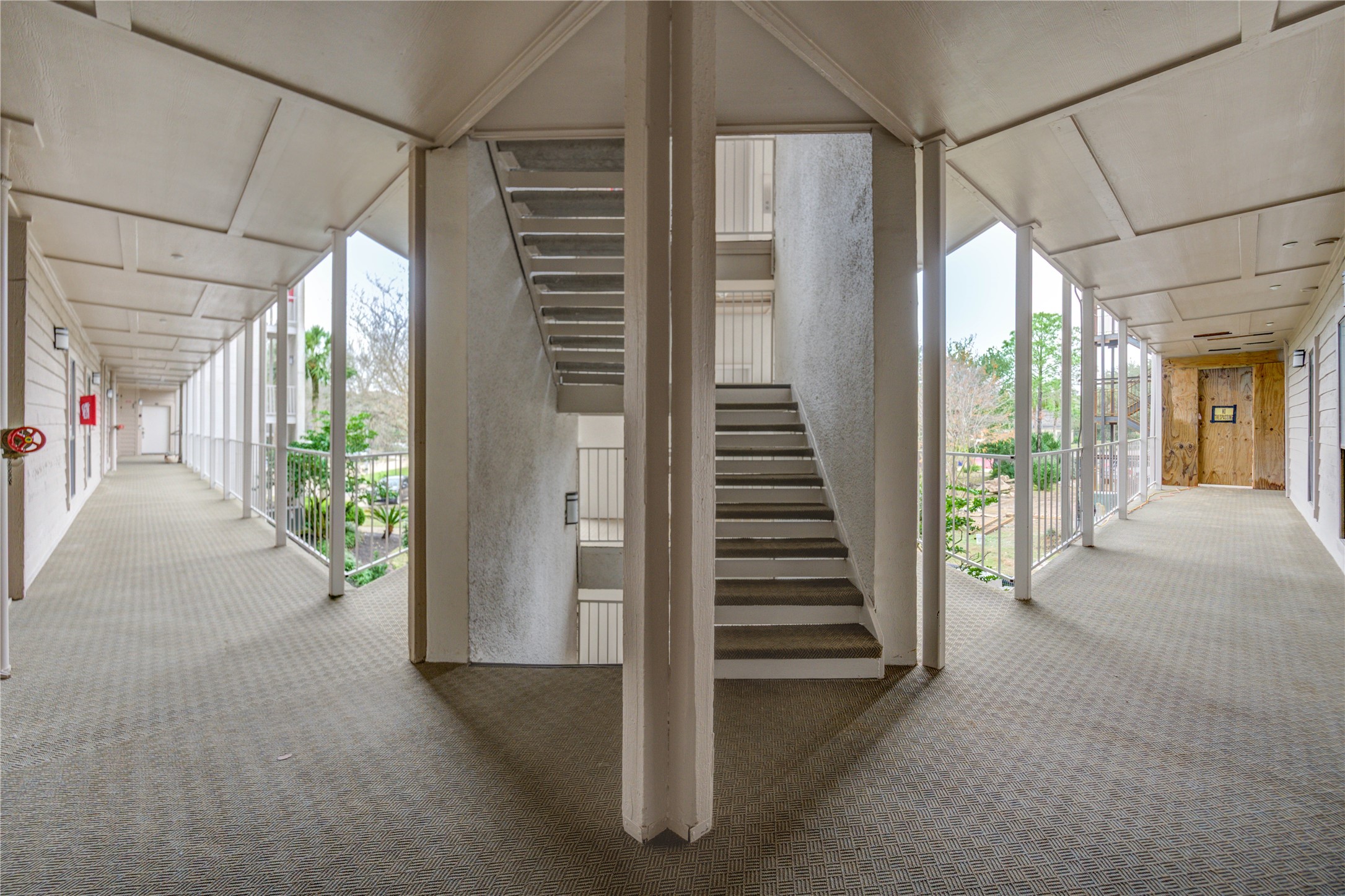 401 Lakeside Lane, Unit 106 Houston, TX 77058 - Photo 38 of 44 a view of a porch with wooden floor and stairs