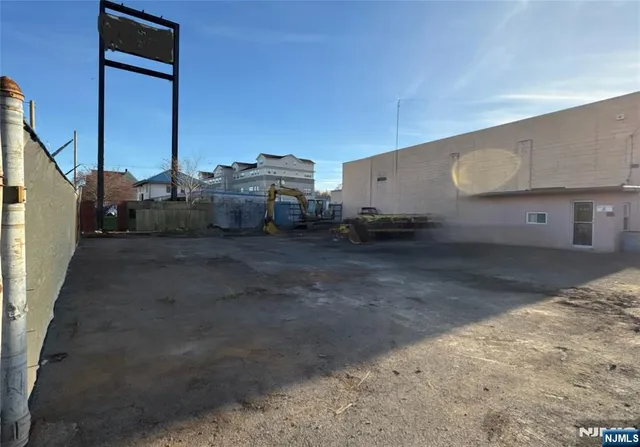 a view of a truck parked in a yard