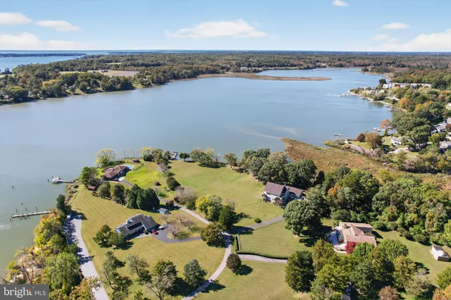 an aerial view of ocean with residential house space
