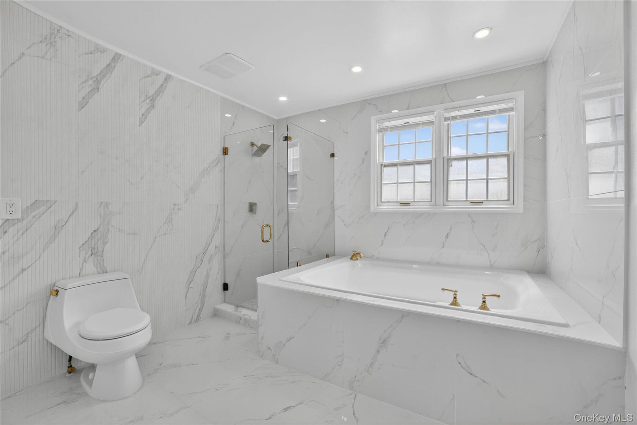 263 Croydon Road Yonkers, NY 10710 - Photo 16 of 43 a white bath tub sitting next to a white toilet