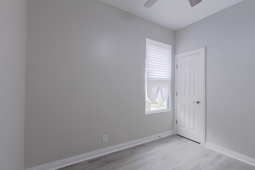 8538 South May Street Chicago, IL 60620 - Photo 16 of 38 an empty room with windows