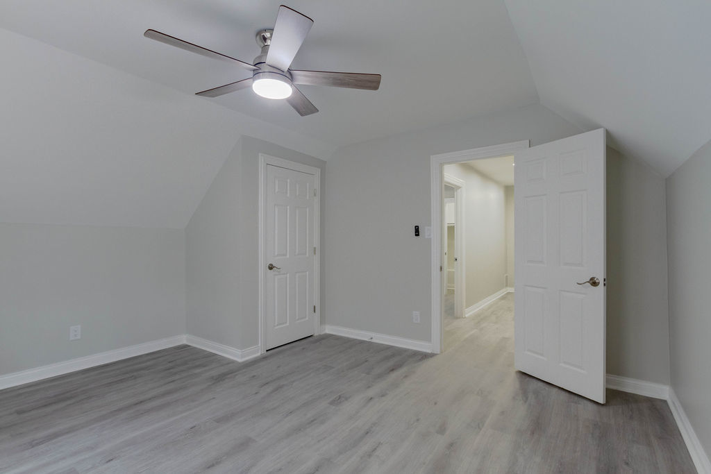 8538 South May Street Chicago, IL 60620 - Photo 27 of 38 a view of an empty room with wooden floor