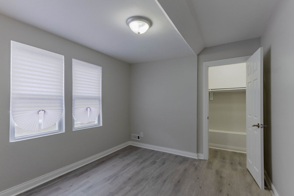 8538 South May Street Chicago, IL 60620 - Photo 28 of 38 an empty room with a window