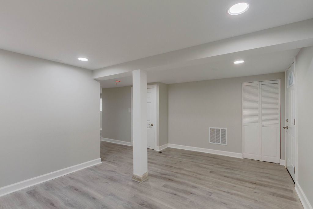 8538 South May Street Chicago, IL 60620 - Photo 33 of 38 a view of an empty room with wooden floor