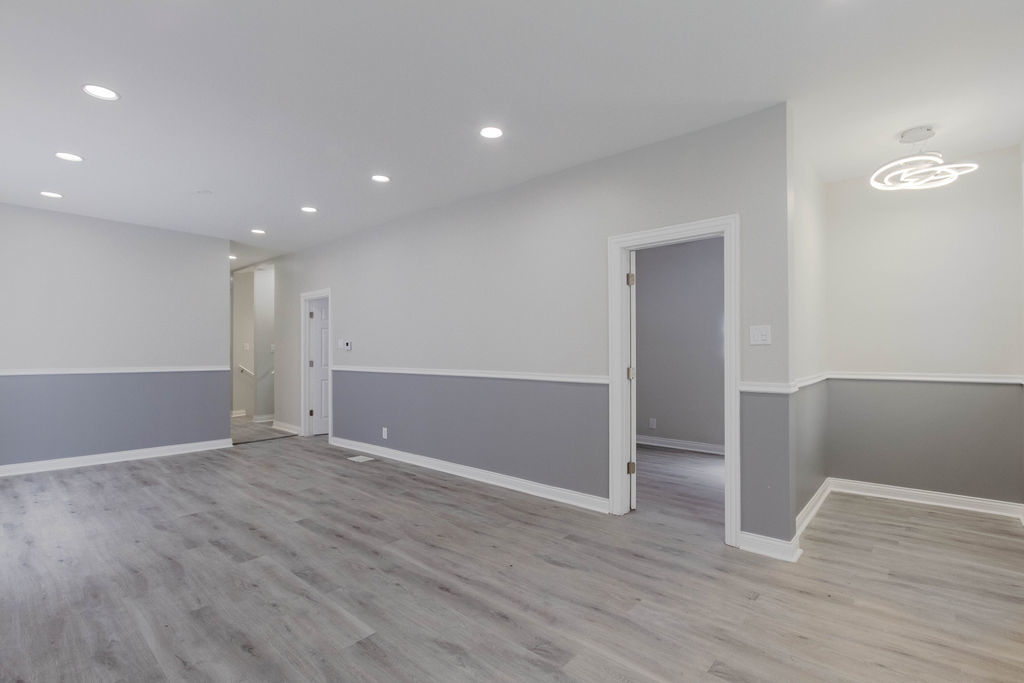 8538 South May Street Chicago, IL 60620 - Photo 4 of 38 a view of an empty room with wooden floor