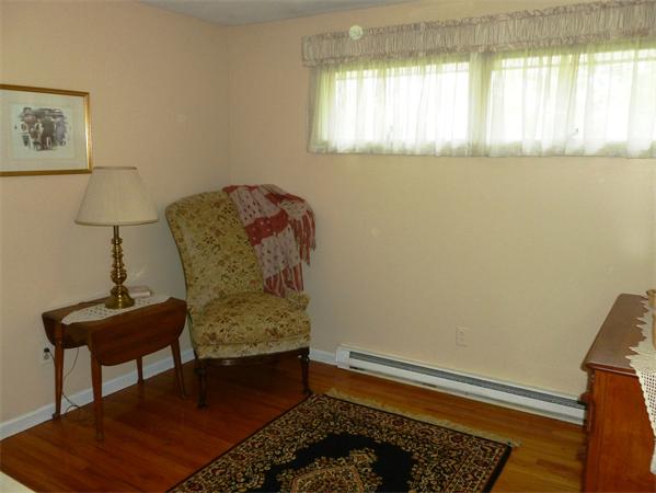 33 Red Bridge Road Wilbraham, MA 01095 - Photo 14 of 21 a room with window and a wooden floor
