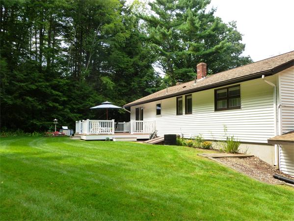 33 Red Bridge Road Wilbraham, MA 01095 - Photo 20 of 21 a view of a house with a yard and sitting area