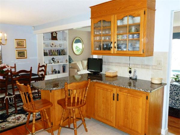 33 Red Bridge Road Wilbraham, MA 01095 - Photo 4 of 21 a view of a kitchen area with furniture and wooden floor