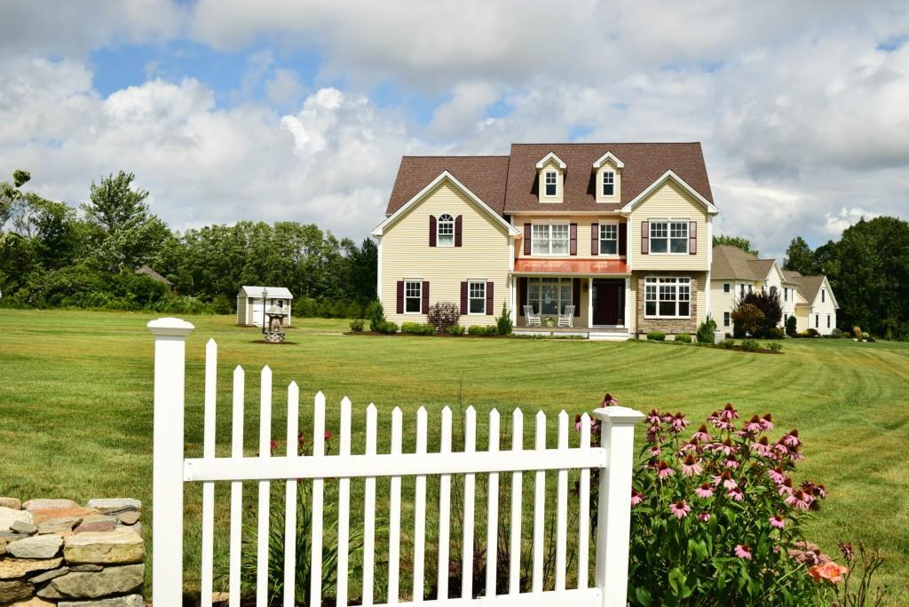 46 High Ridge Farm Lane Bolton, CT 06043 - Photo 1 of 1 a front view of a house with a yard