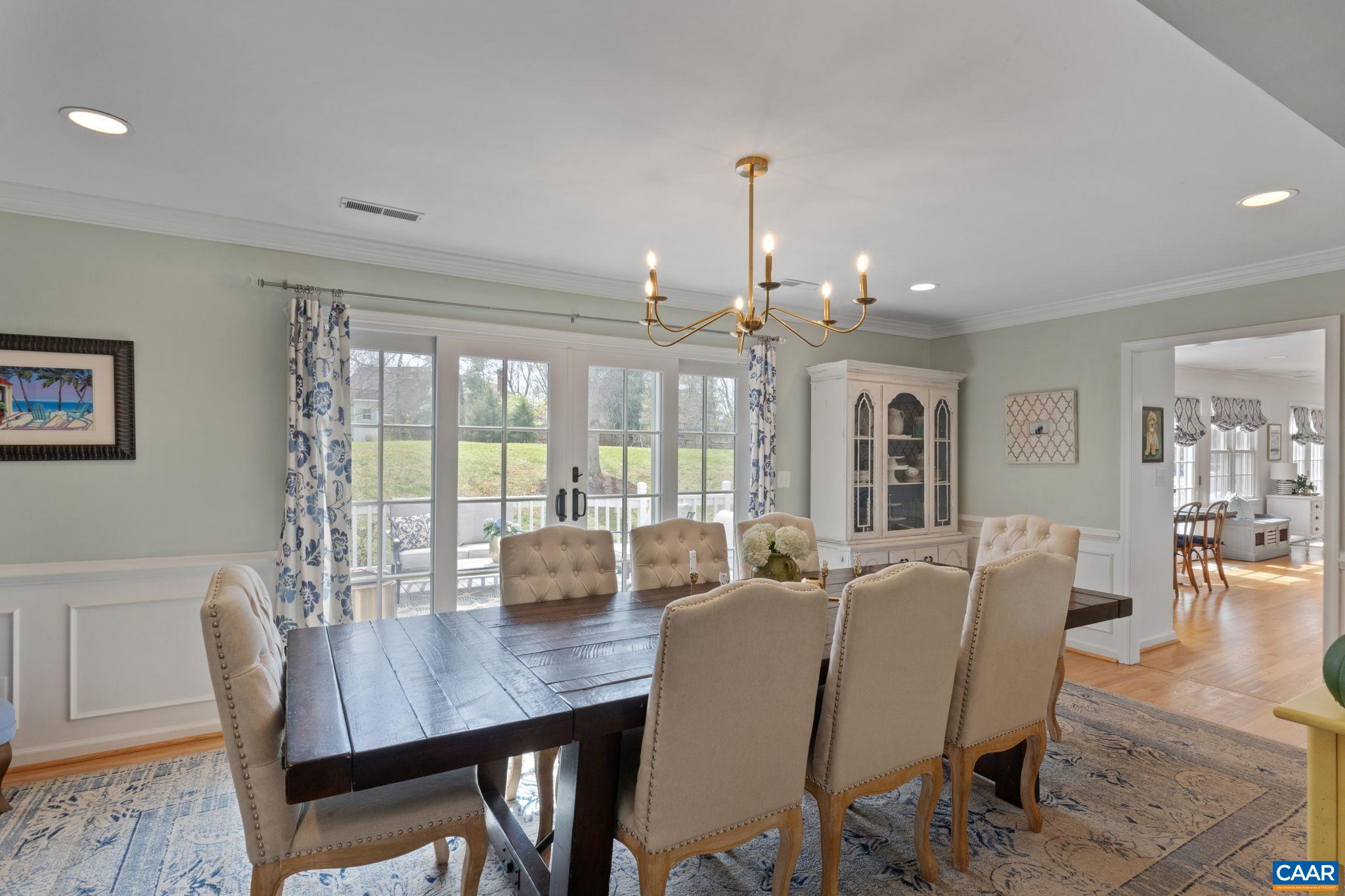 2603 Holkham Drive Charlottesville, VA 22901 - Photo 14 of 60 a view of a dining room with furniture window and wooden floor
