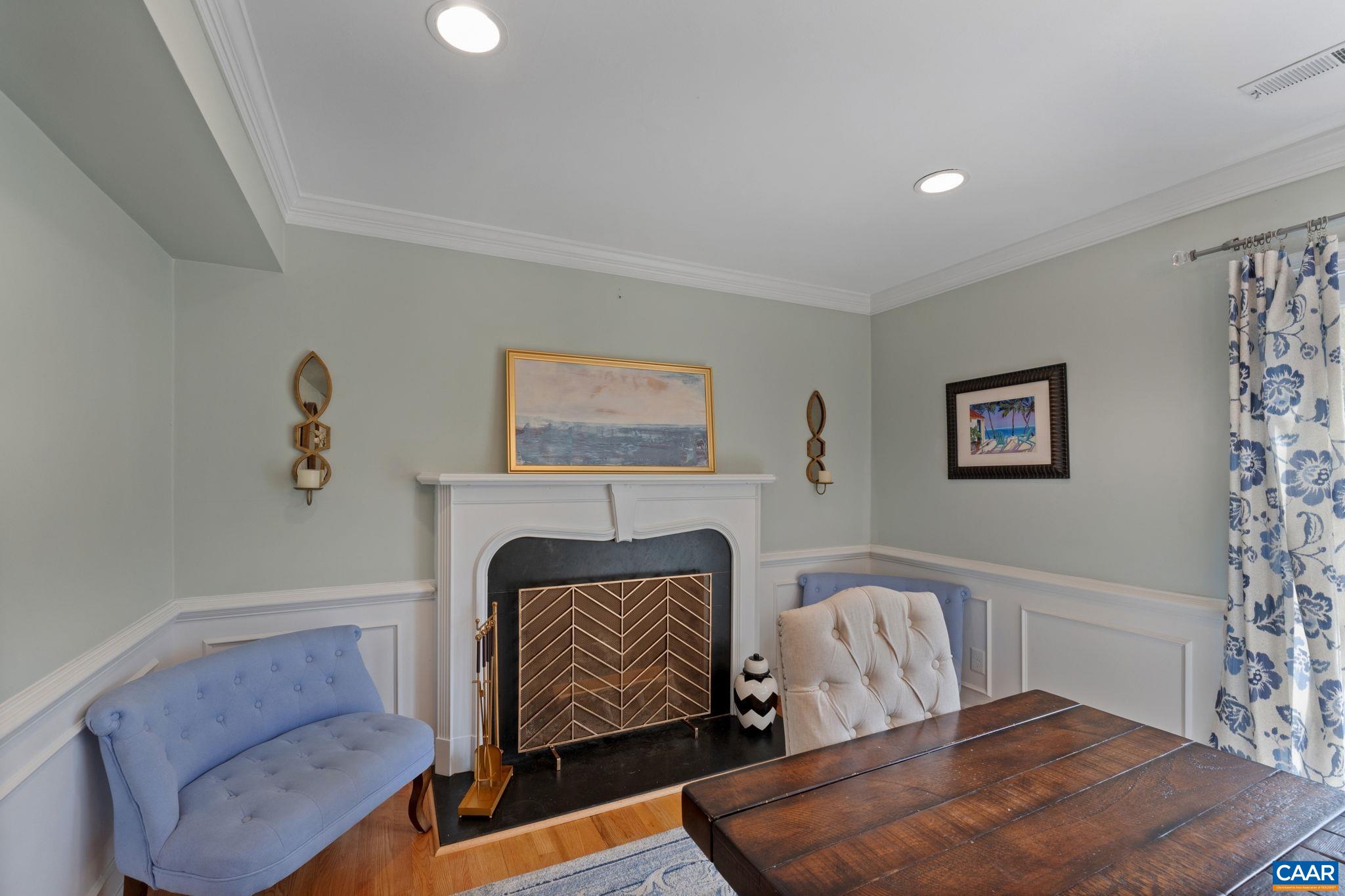 2603 Holkham Drive Charlottesville, VA 22901 - Photo 15 of 60 a living room with furniture and a fireplace