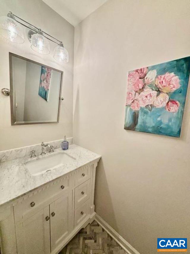 2603 Holkham Drive Charlottesville, VA 22901 - Photo 16 of 60 a bathroom with a sink mirror and vanity