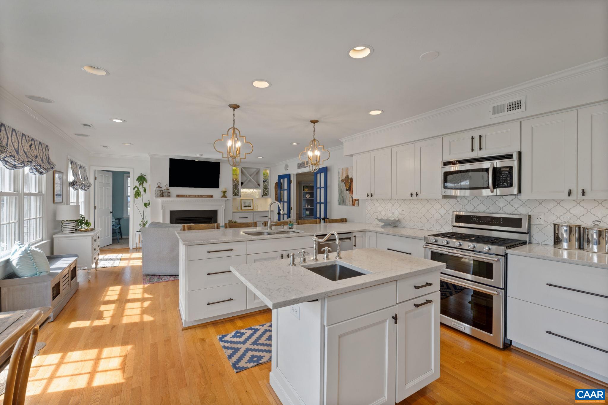 2603 Holkham Drive Charlottesville, VA 22901 - Photo 17 of 60 a kitchen with stainless steel appliances a stove sink microwave and cabinets