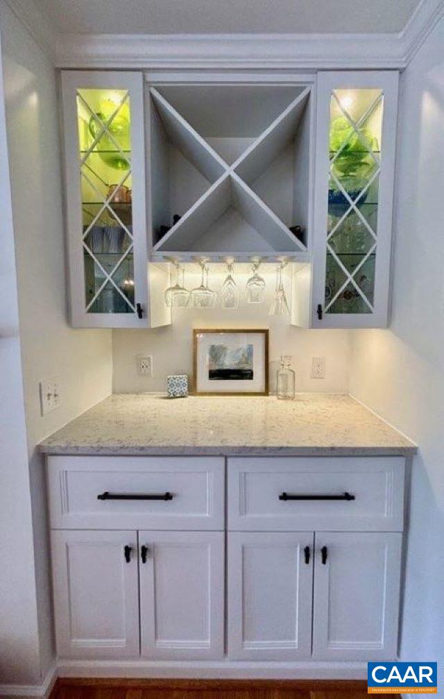 2603 Holkham Drive Charlottesville, VA 22901 - Photo 28 of 60 a kitchen with a sink a counter top space and a wooden floor