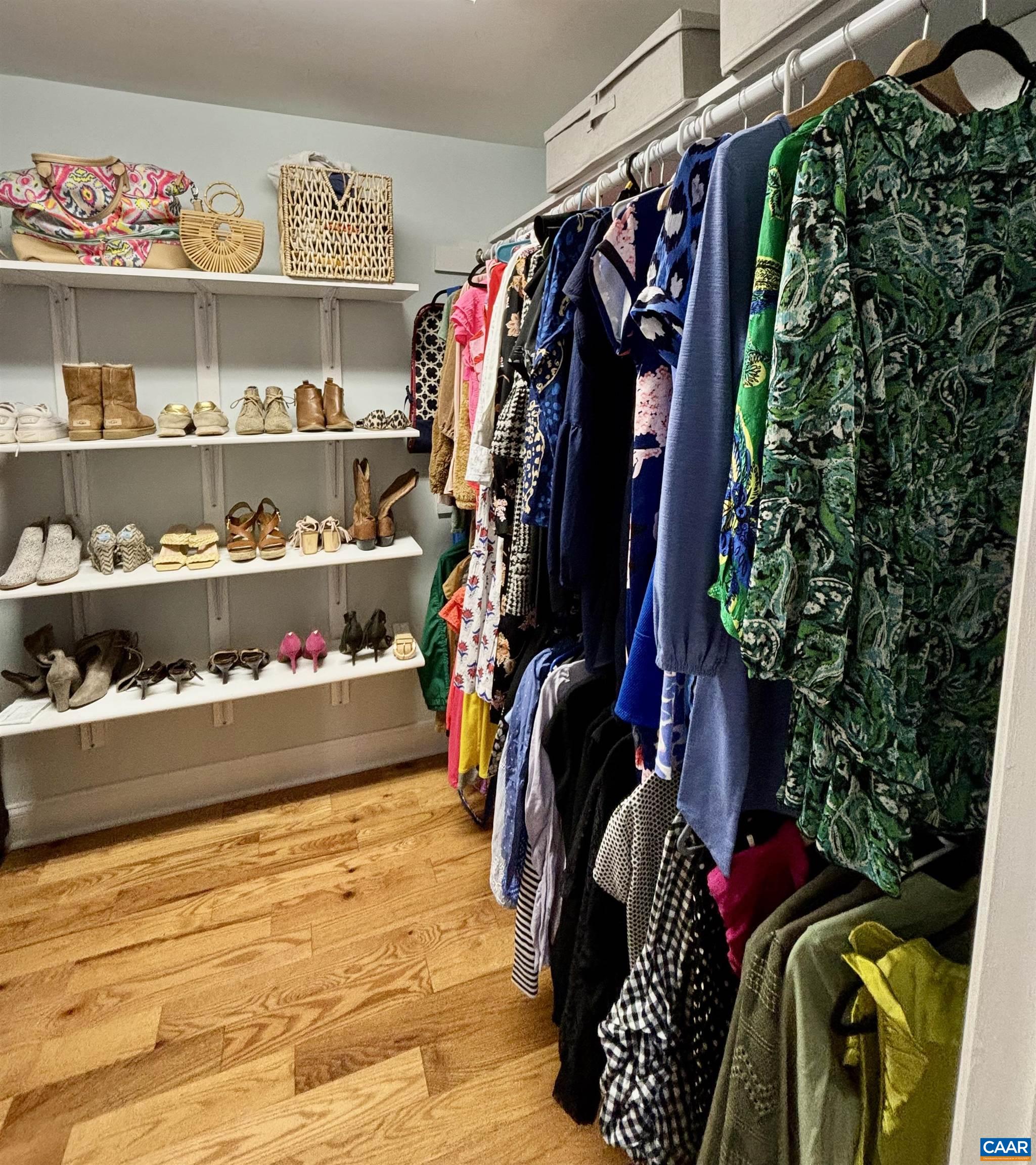 2603 Holkham Drive Charlottesville, VA 22901 - Photo 35 of 60 a view of walk in closet with clothes and shoes