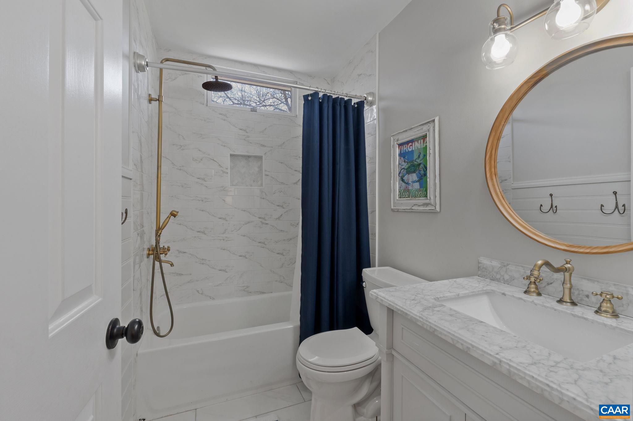 2603 Holkham Drive Charlottesville, VA 22901 - Photo 41 of 60 a bathroom with a granite countertop sink toilet and shower