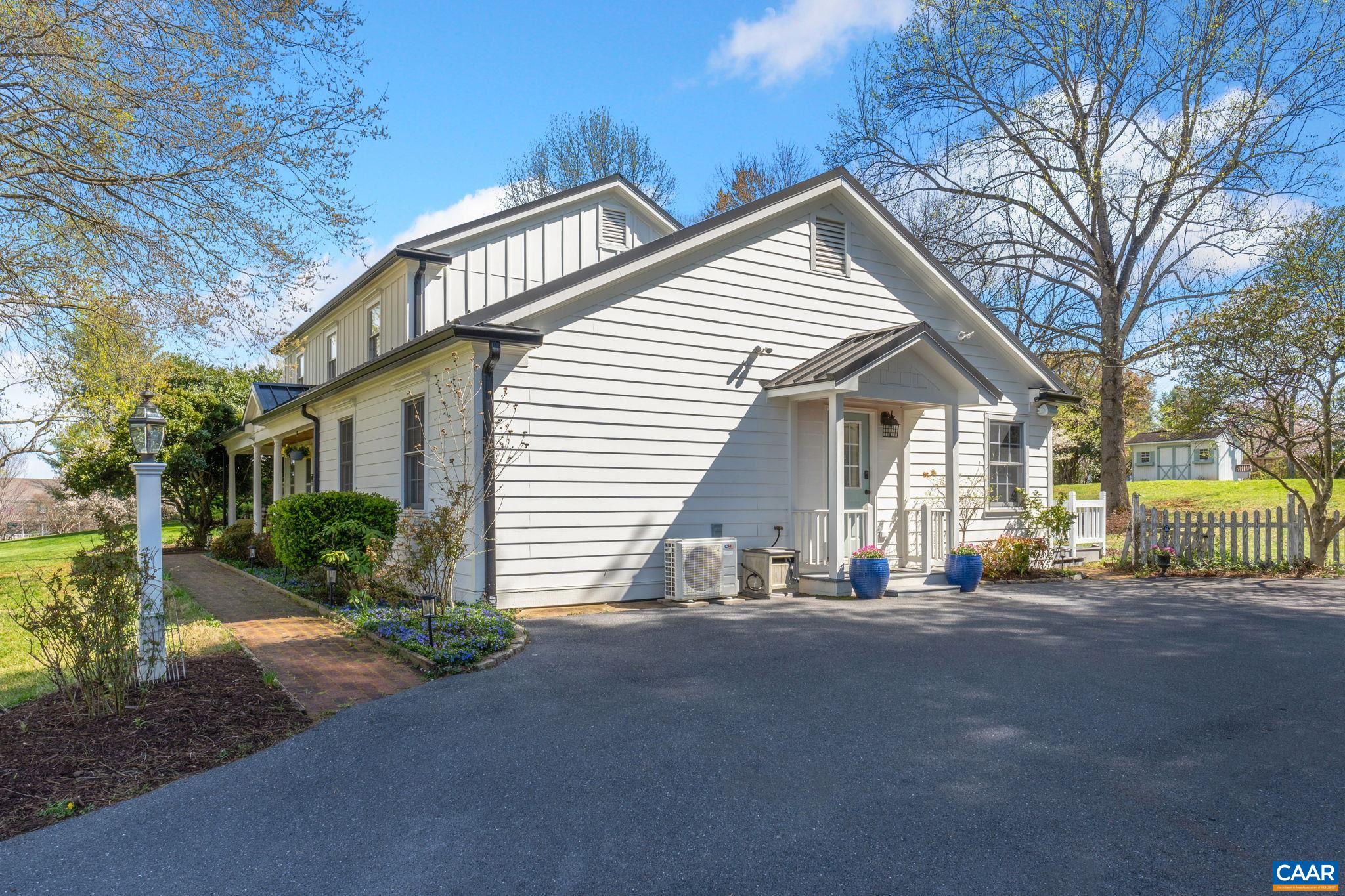 2603 Holkham Drive Charlottesville, VA 22901 - Photo 43 of 60 a view of a house with a yard and plants