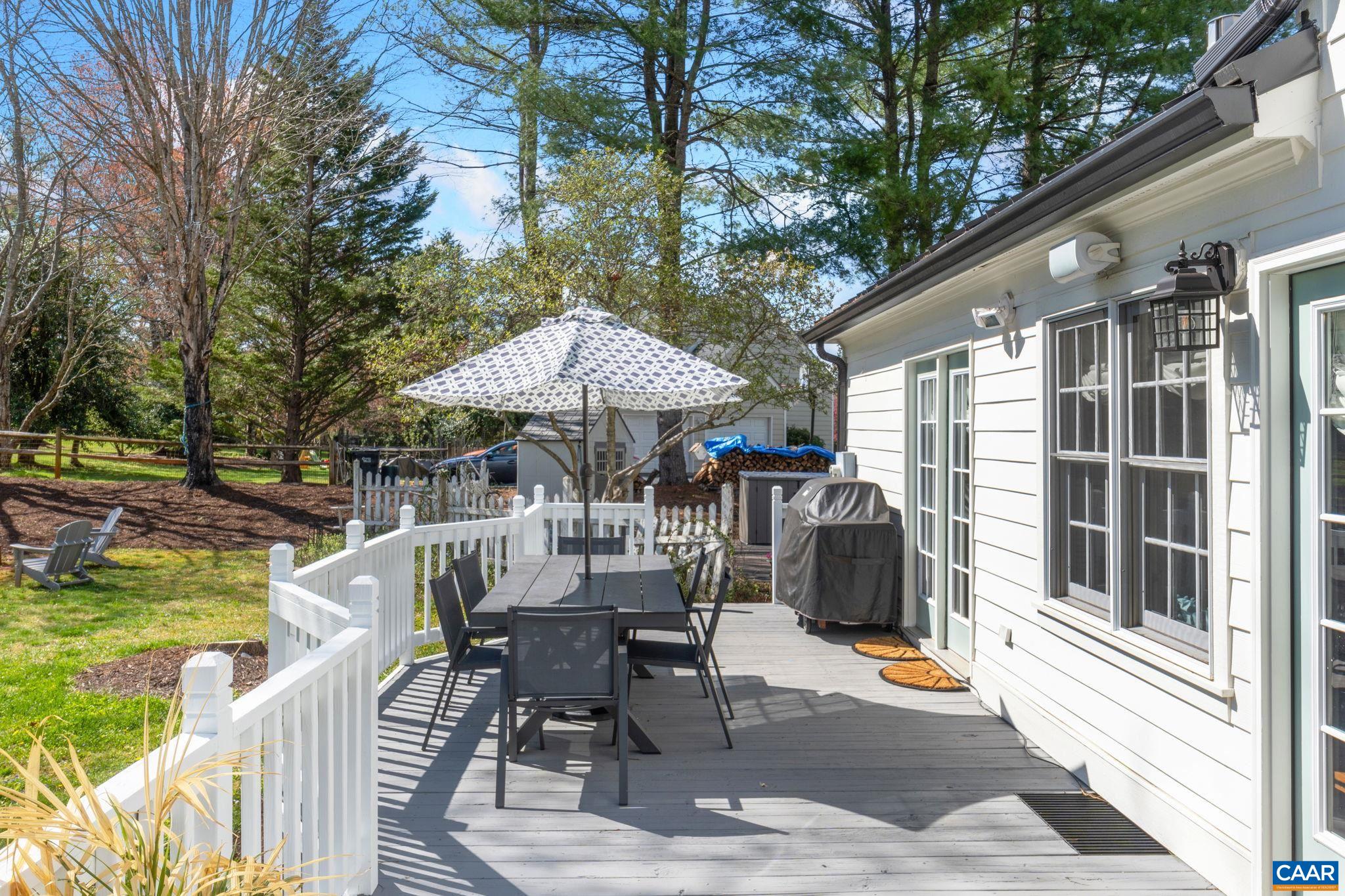 2603 Holkham Drive Charlottesville, VA 22901 - Photo 47 of 60 an outdoor space with furniture and umbrella