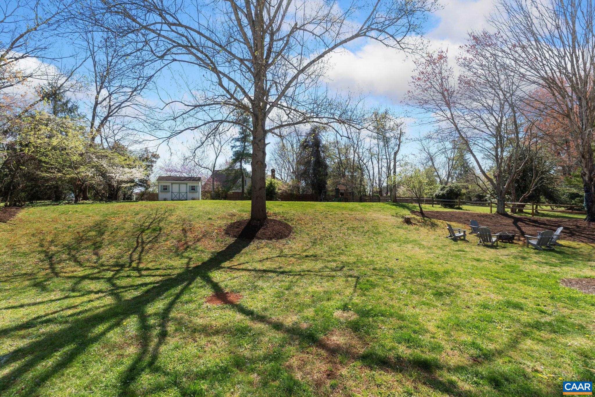2603 Holkham Drive Charlottesville, VA 22901 - Photo 48 of 60 a view of yard with swimming pool and trees