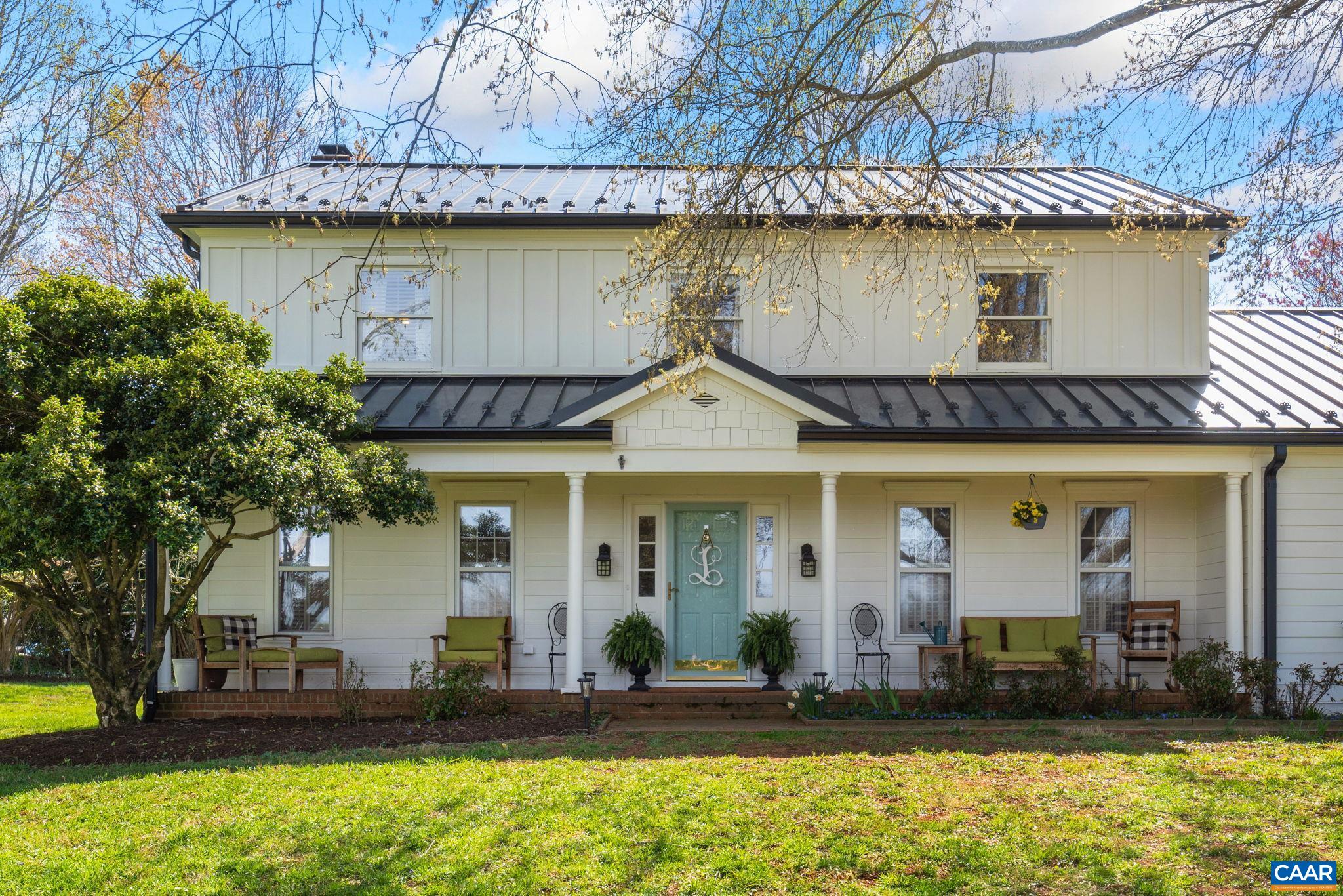 2603 Holkham Drive Charlottesville, VA 22901 - Photo 51 of 60 a front view of a house with a yard