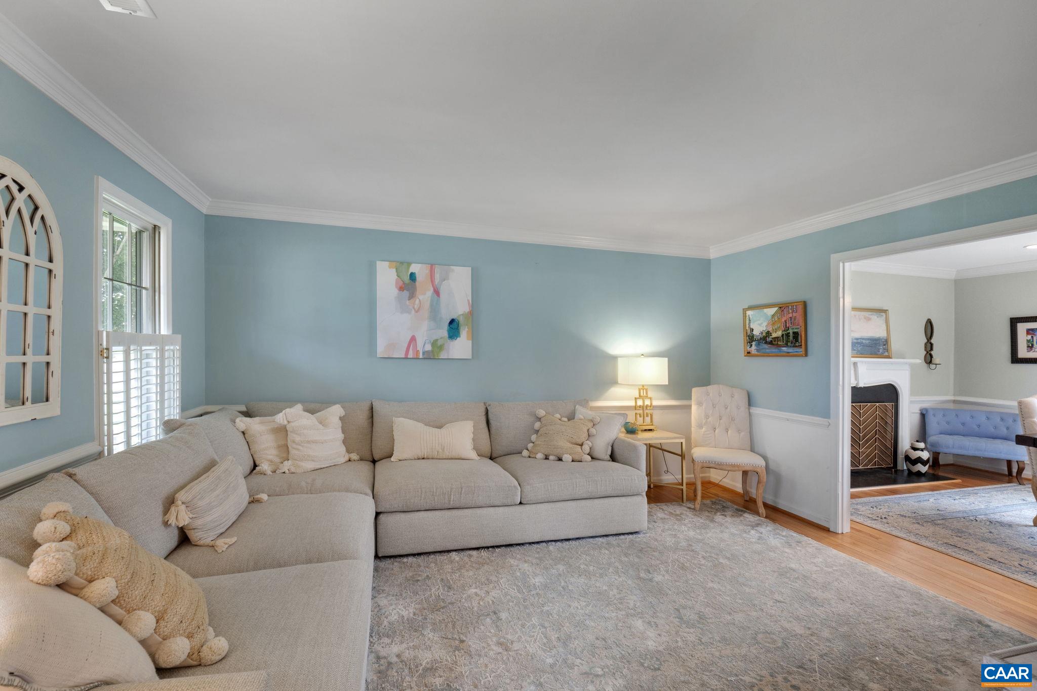 2603 Holkham Drive Charlottesville, VA 22901 - Photo 9 of 60 a living room with furniture white walls and a lamp