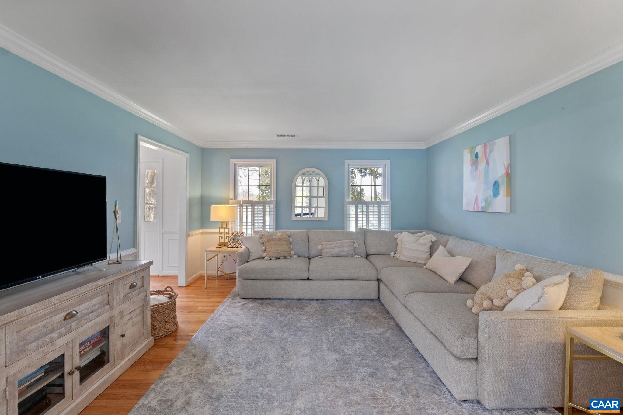 2603 Holkham Drive Charlottesville, VA 22901 - Photo 10 of 60 a living room with furniture and a flat screen tv