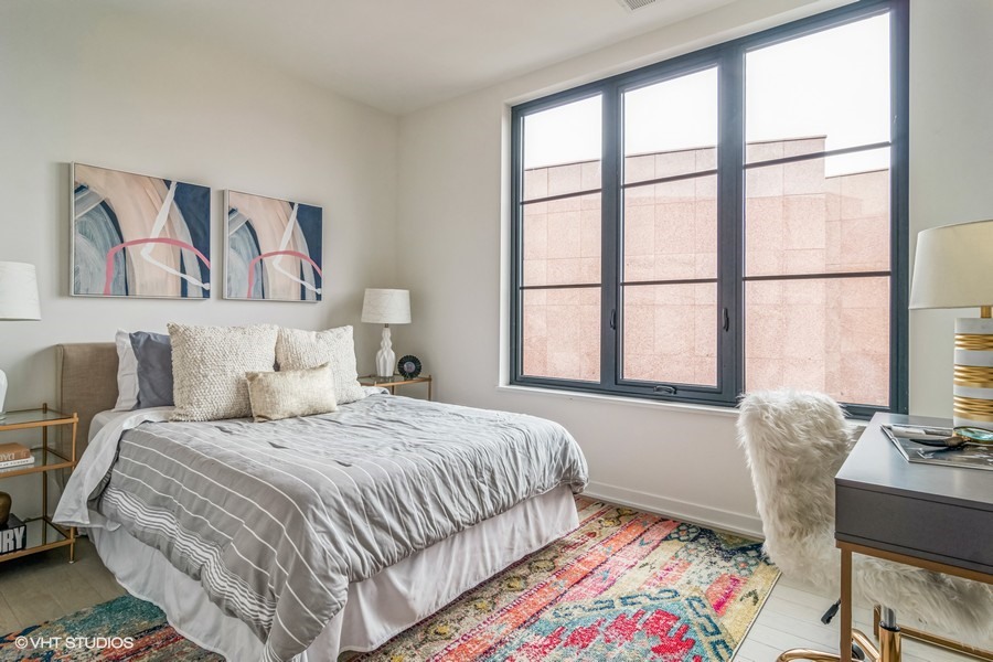 1400 West Monroe Street, Unit 6E Chicago, IL 60607 - Photo 11 of 12 a bedroom with a bed and a window