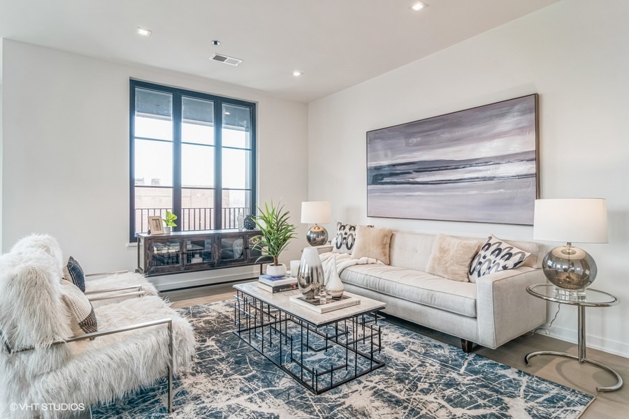1400 West Monroe Street, Unit 6E Chicago, IL 60607 - Photo 7 of 12 a living room with furniture and a large window