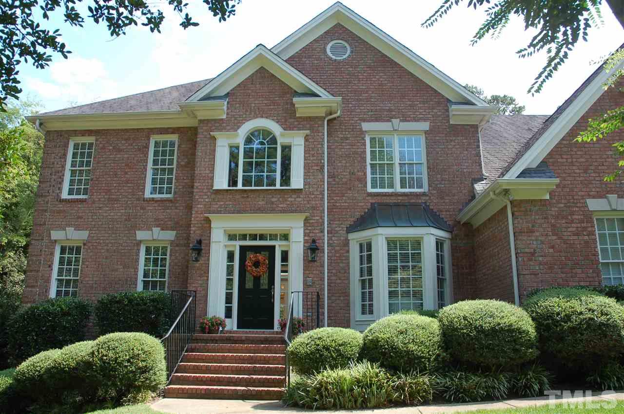 10900 Fitzwilliam Street Raleigh, NC 27614 - Photo 1 of 25 a front view of a house with garden