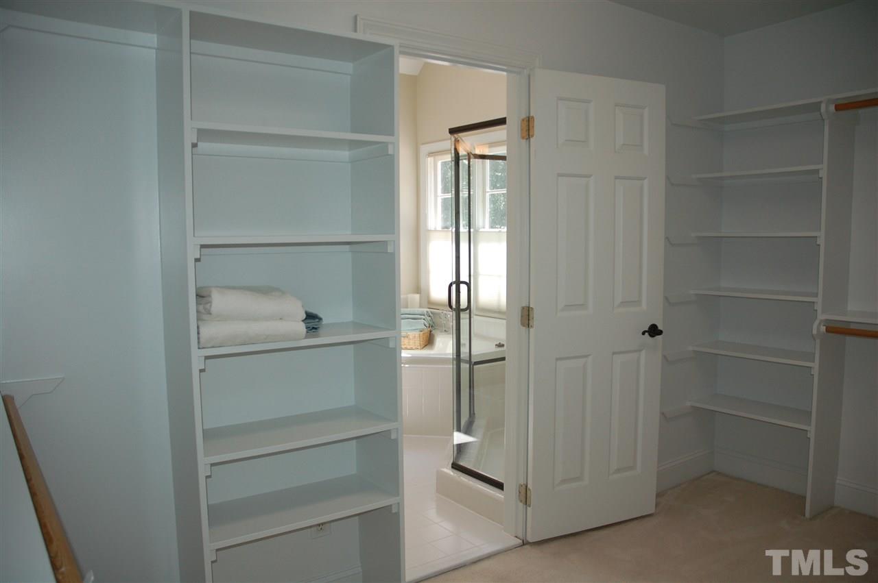 10900 Fitzwilliam Street Raleigh, NC 27614 - Photo 11 of 25 a view of walk in closet with empty racks