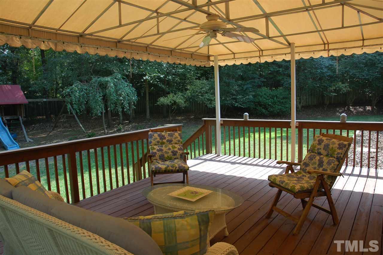 10900 Fitzwilliam Street Raleigh, NC 27614 - Photo 21 of 25 a view of a chairs and table on the deck